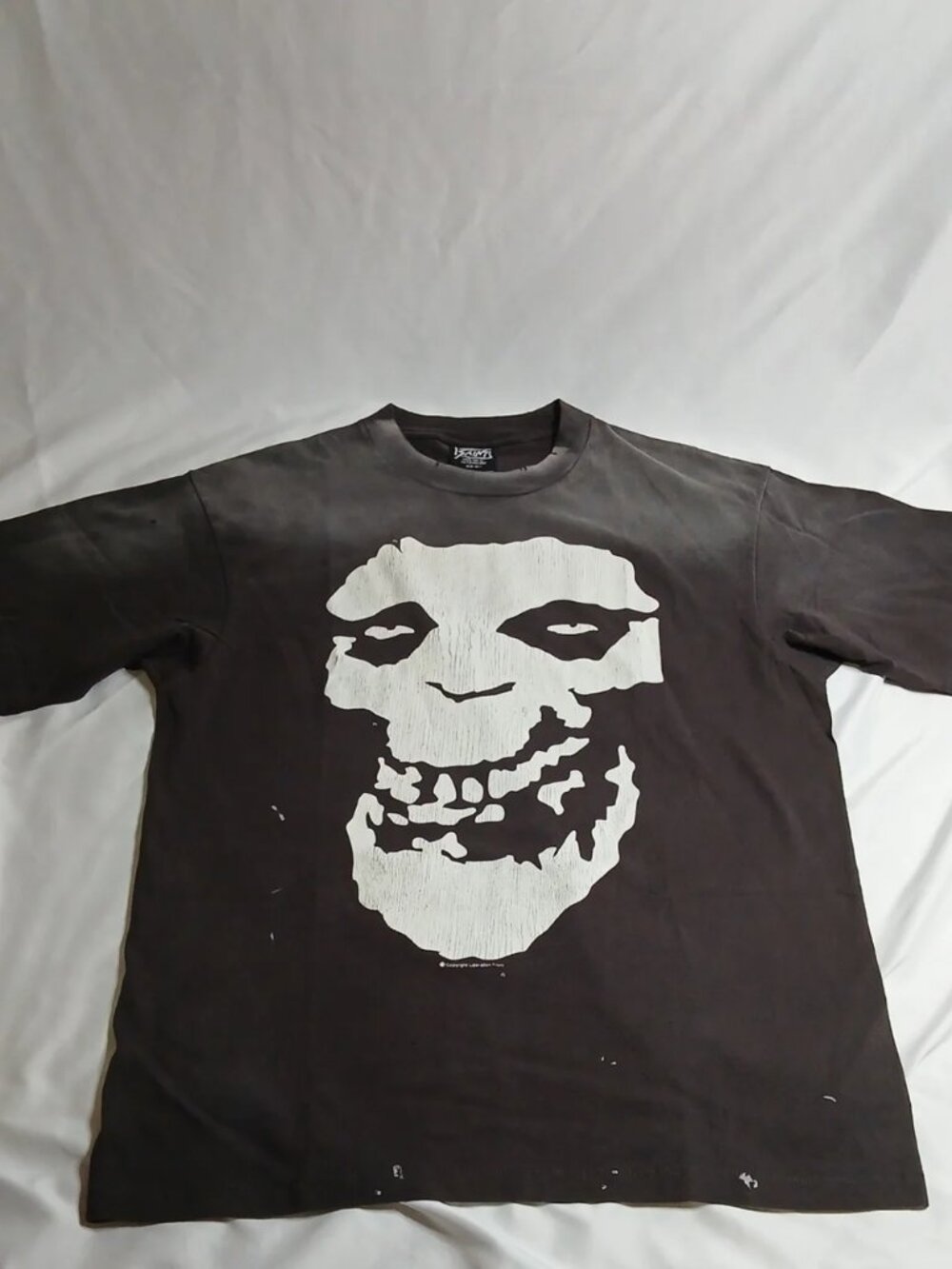Bape x Saint Mxxxxxx S.S.A.L.A Black Tee with White Graphic Skull